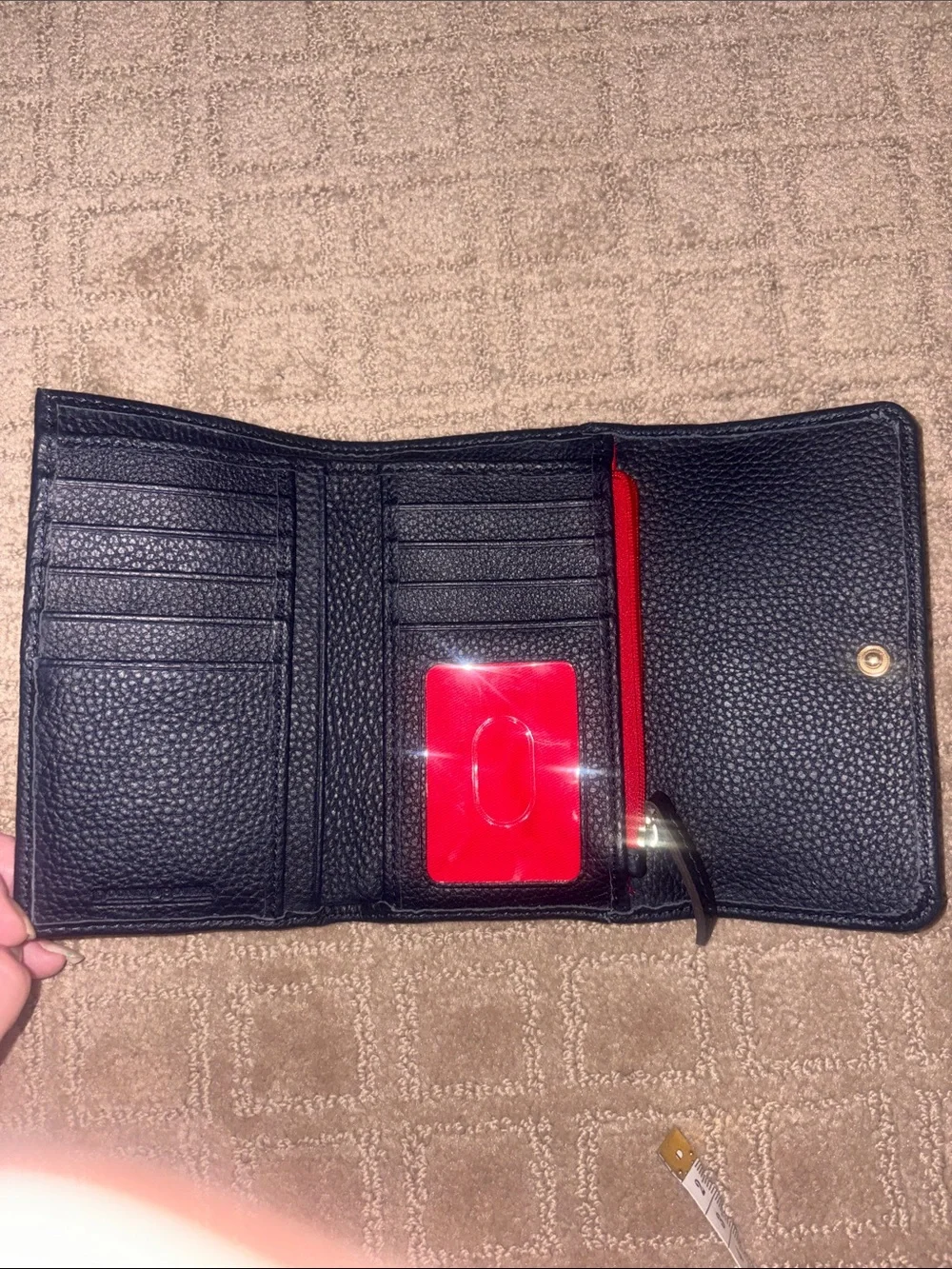 Dooney & Bourke Black Pebbled Leather Flap wallet